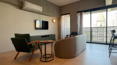 Two-bedroom Master Apartment at Heritage X, with a living area, kitchen and balcony