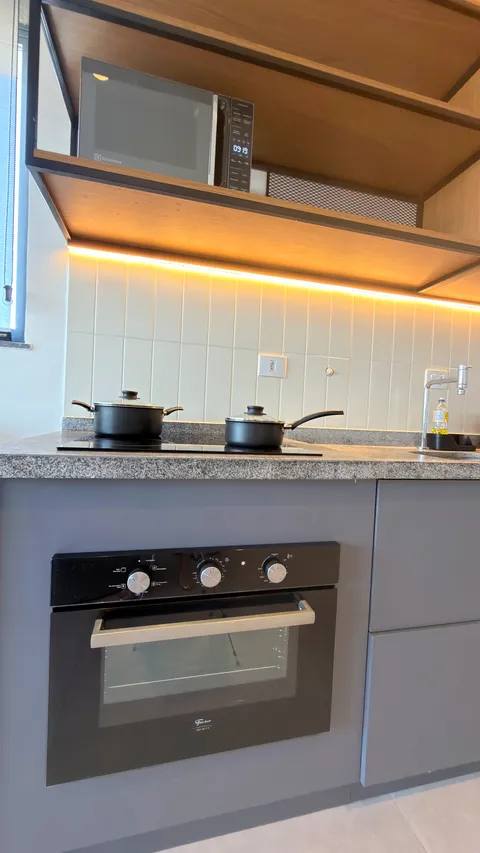 Two-bedroom Master Apartment at Heritage X, with a living area, kitchen and balcony