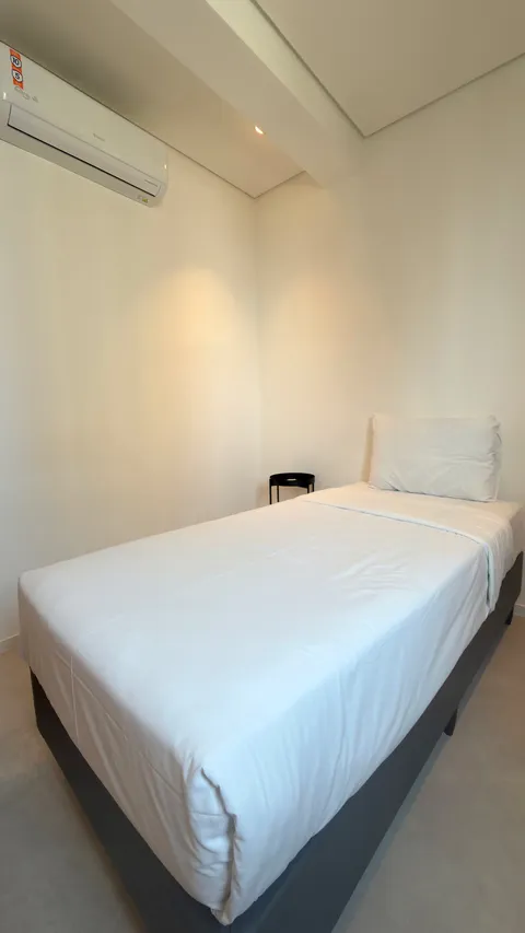 Two-bedroom Master Apartment at Heritage X, with a living area, kitchen and balcony
