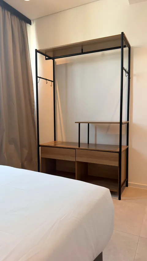 Two-bedroom Master Apartment at Heritage X, with a living area, kitchen and balcony