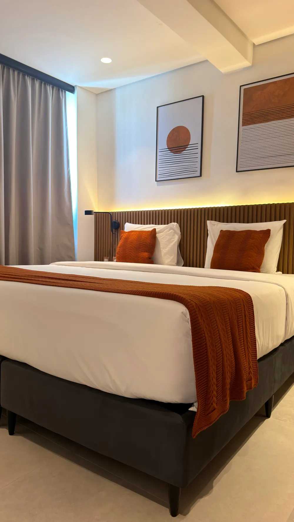 Two-bedroom Master Apartment at Heritage X, with a living area, kitchen and balcony