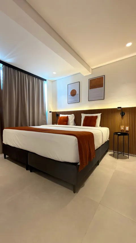 Two-bedroom Master Apartment at Heritage X, with a living area, kitchen and balcony