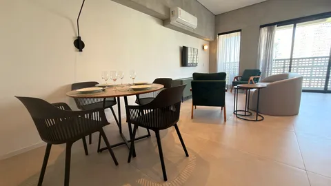 Two-bedroom Master Apartment at Heritage X, with a living area, kitchen and balcony