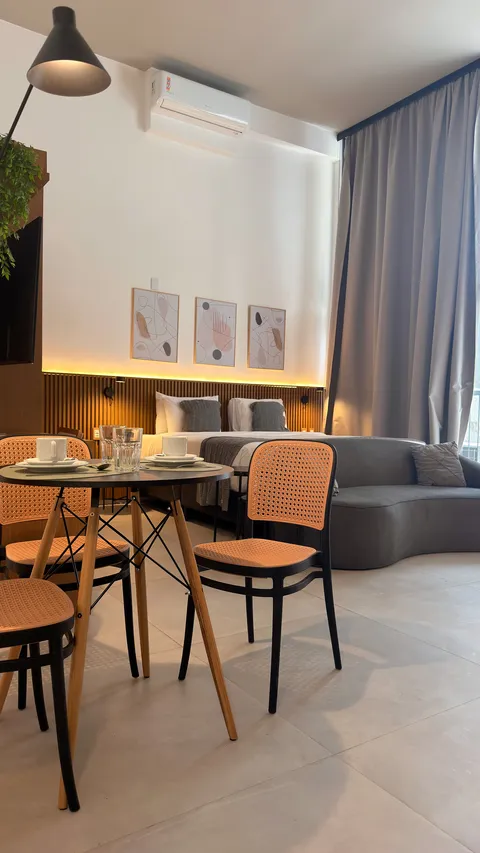 Studio at Heritage X, with a king bed, living area and equipped kitchen