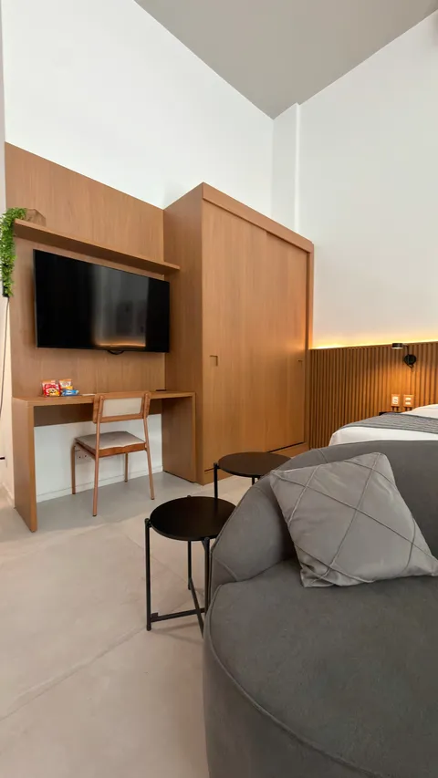 Studio at Heritage X, with a king bed, living area and equipped kitchen