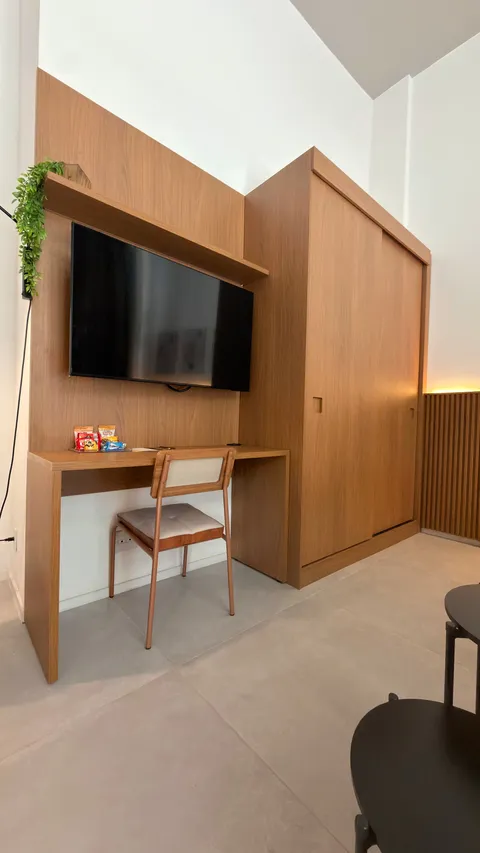 Studio at Heritage X, with a king bed, living area and equipped kitchen