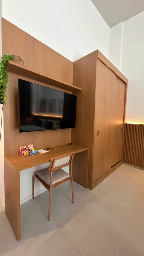 Studio at Heritage X, with a king bed, living area and equipped kitchen