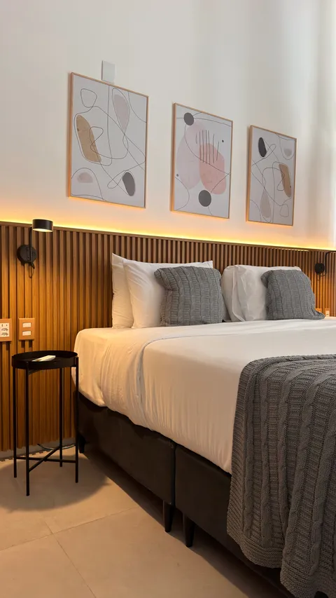 Studio at Heritage X, with a king bed, living area and equipped kitchen