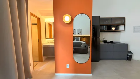 Studio at Heritage X, with a king bed, living area and equipped kitchen