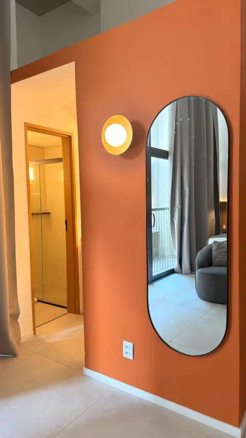 Studio at Heritage X, with a king bed, living area and equipped kitchen