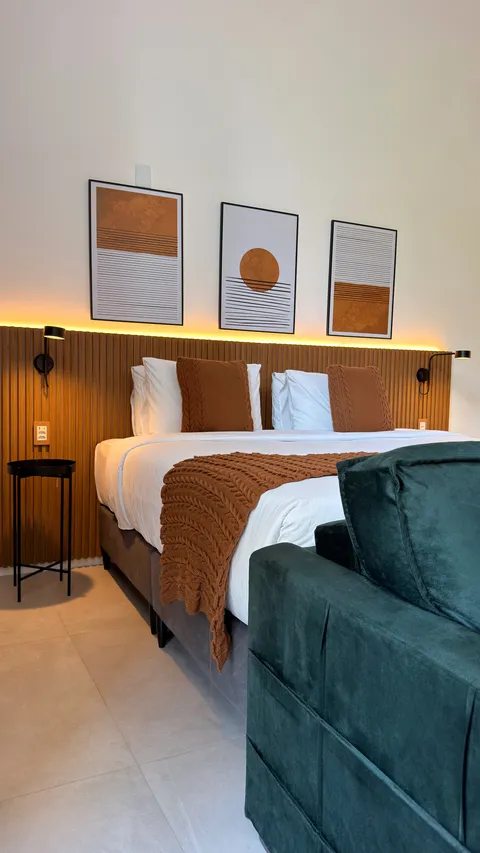 Studio at Heritage X, with a king bed, living area and equipped kitchen