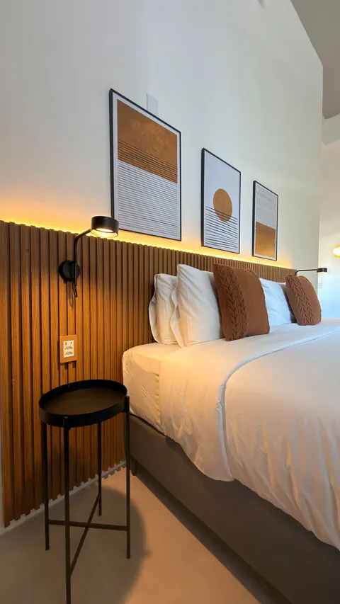 Studio at Heritage X, with a king bed, living area and equipped kitchen