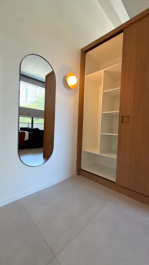 Studio at Heritage X, with a king bed, living area and equipped kitchen