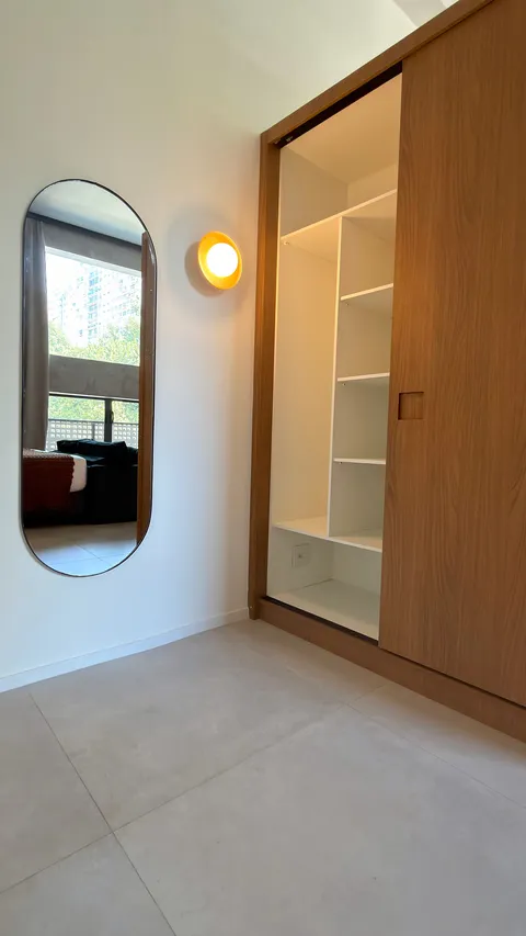 Studio at Heritage X, with a king bed, living area and equipped kitchen