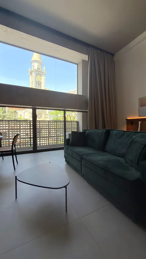 Studio at Heritage X, with a king bed, living area and equipped kitchen