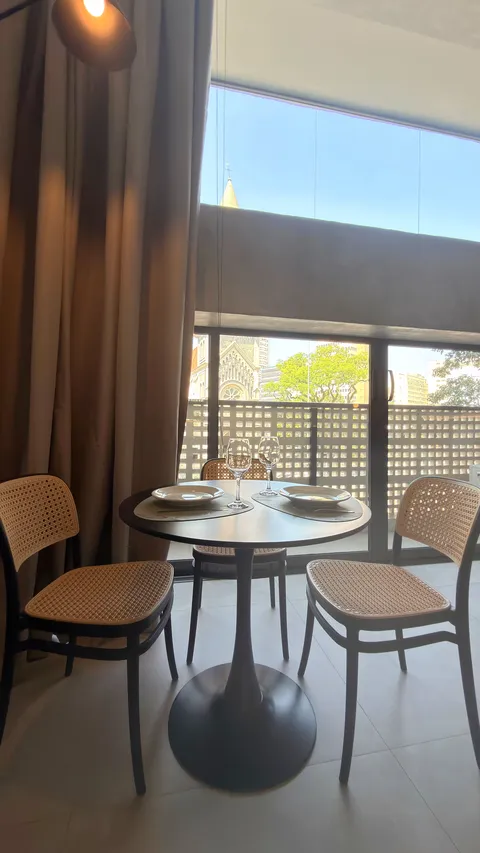 Studio at Heritage X, with a king bed, living area and equipped kitchen