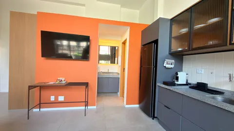 Studio at Heritage X, with a king bed, living area and equipped kitchen