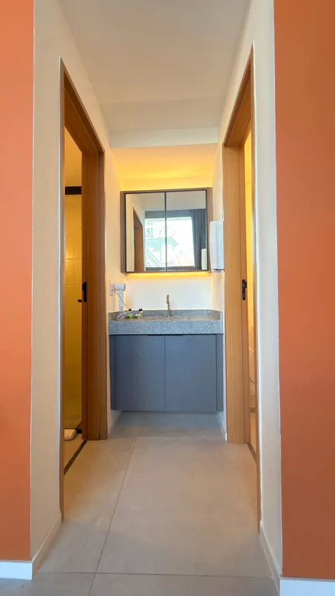 Studio at Heritage X, with a king bed, living area and equipped kitchen