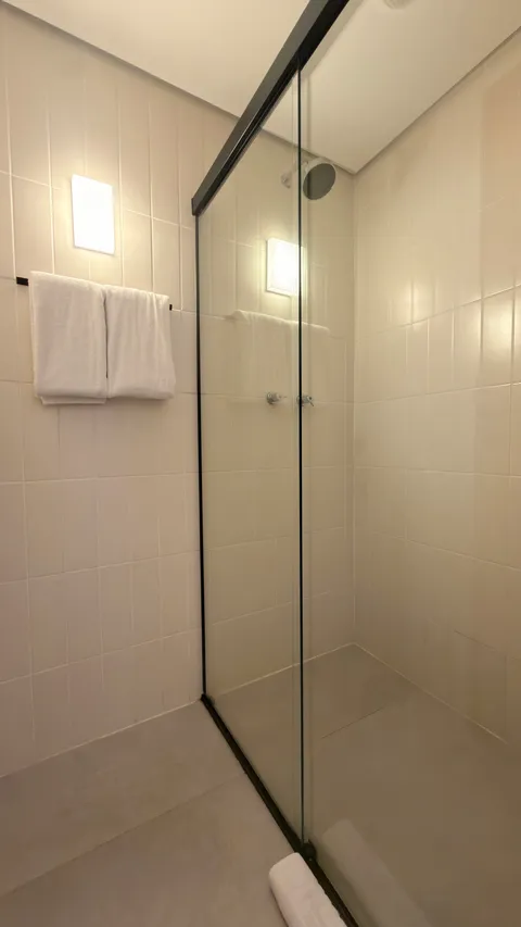 Studio at Heritage X, with a king bed, living area and equipped kitchen