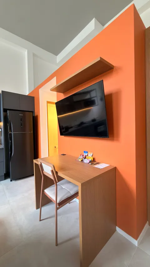 Studio at Heritage X, with a king bed, living area and equipped kitchen