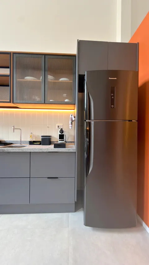 Studio at Heritage X, with a king bed, living area and equipped kitchen