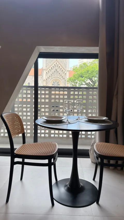 Studio at Heritage X, with a king bed, living area and equipped kitchen