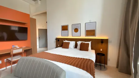 Studio at Heritage X, with a king bed, living area and equipped kitchen