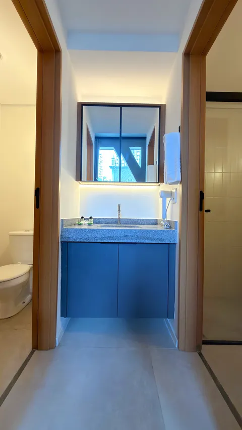 Studio at Heritage X, with a king bed, living area and equipped kitchen