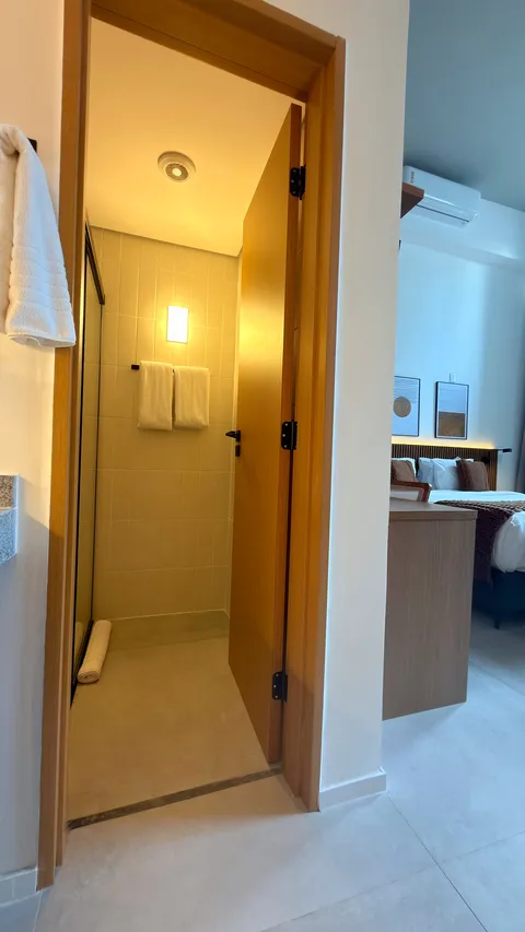Studio at Heritage X, with a king bed, living area and equipped kitchen