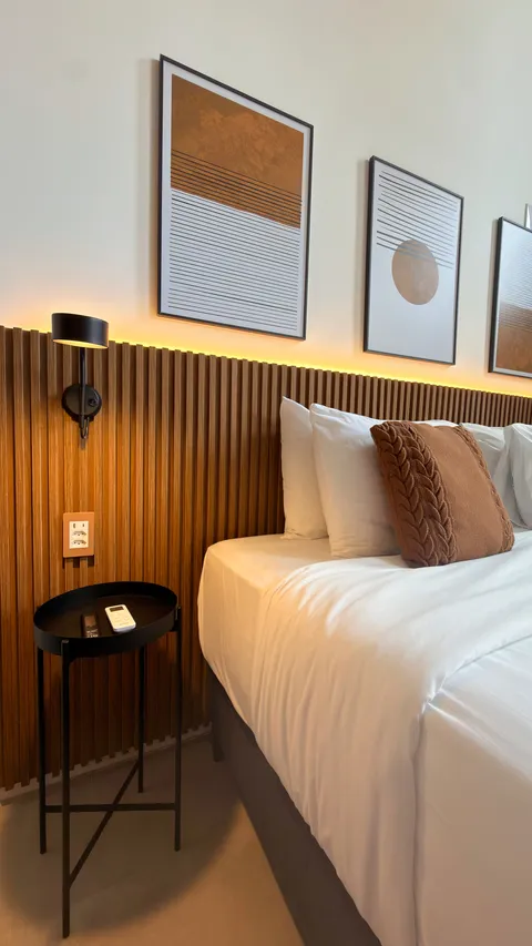 Studio at Heritage X, with a king bed, living area and equipped kitchen