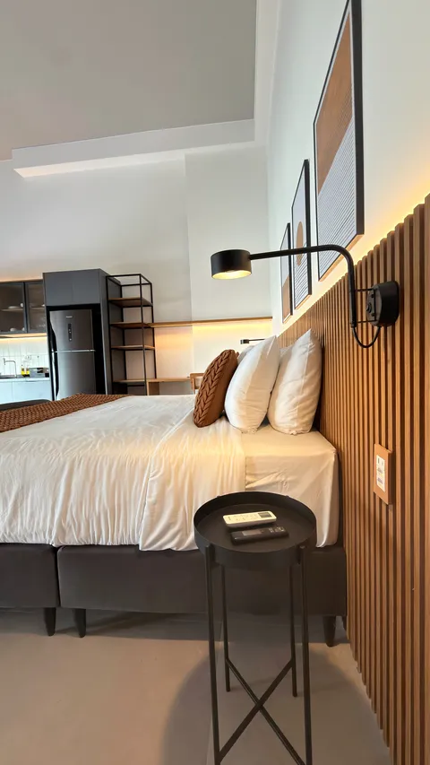 Studio at Heritage X, with a king bed, living area and equipped kitchen