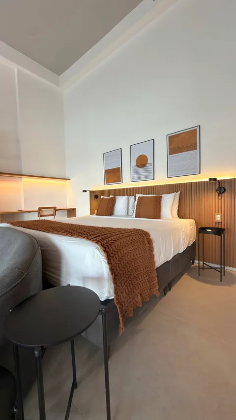 Studio at Heritage X, with a king bed, living area and equipped kitchen