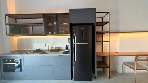 Studio at Heritage X, with a king bed, living area and equipped kitchen