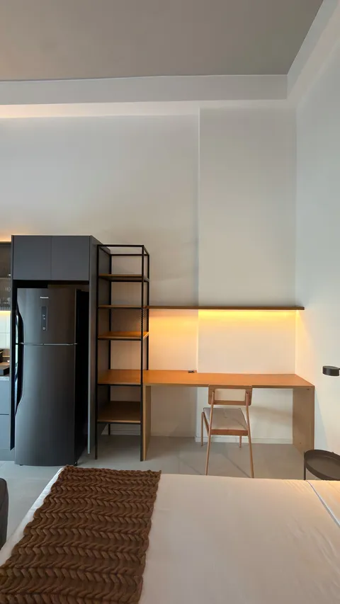 Studio at Heritage X, with a king bed, living area and equipped kitchen