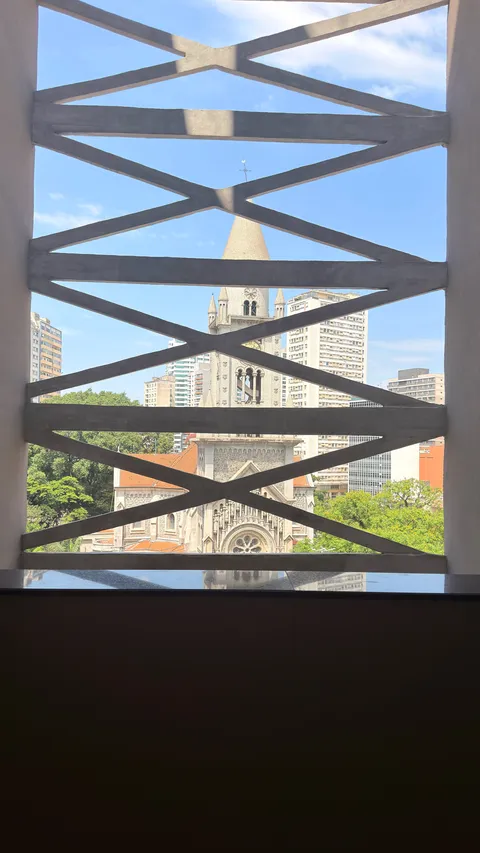 View of the Consolação Church through the X-shaped structure of the façade