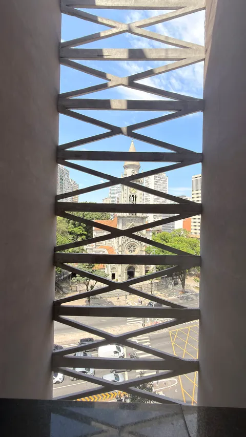 View of the Consolação Church through the X-shaped structure of the façade