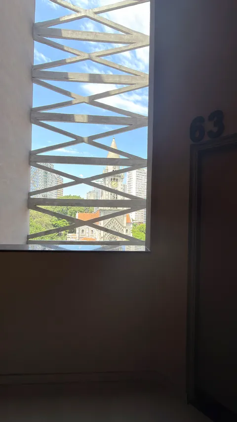 View of the Consolação Church through the X-shaped structure of the façade